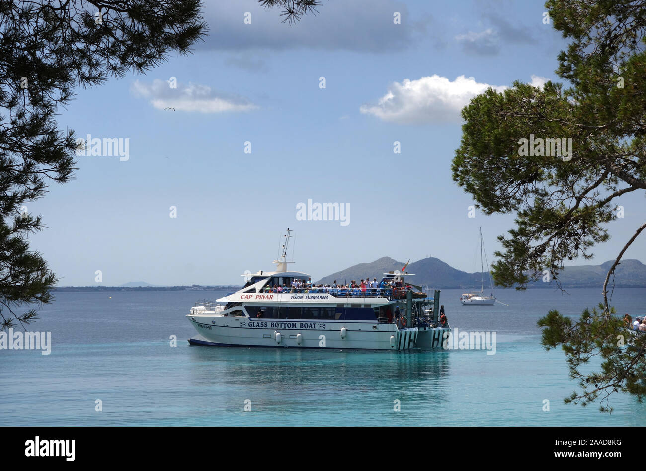 glass bottom boat at Playa de Formentor, Mallorca, Spain Stock Photo