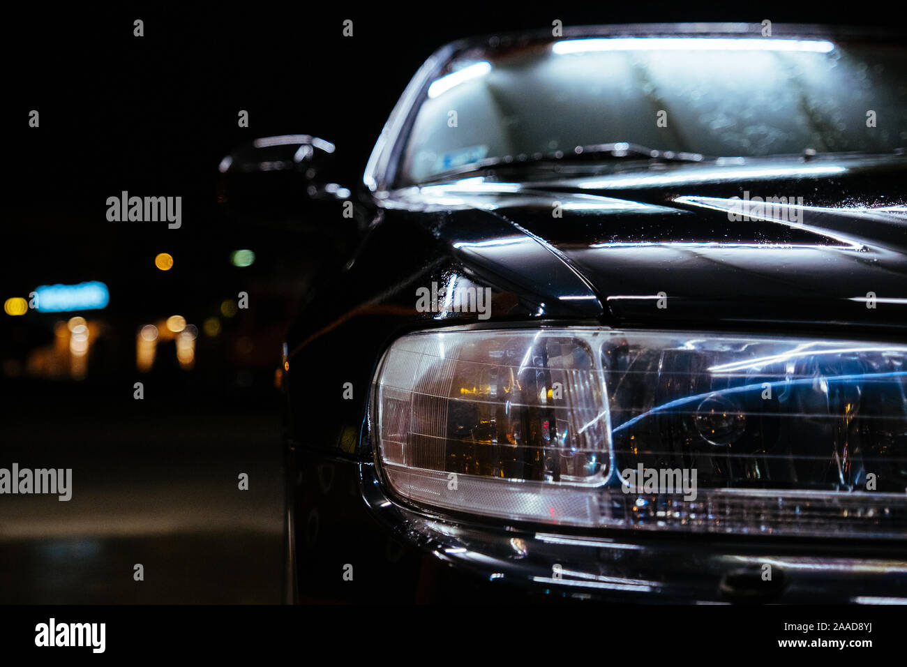 Carwash night time black car and lamp illumination Stock Photo Alamy