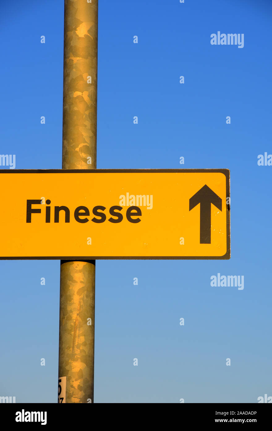roadside roadsign arrow pointing to finesse project Stock Photo