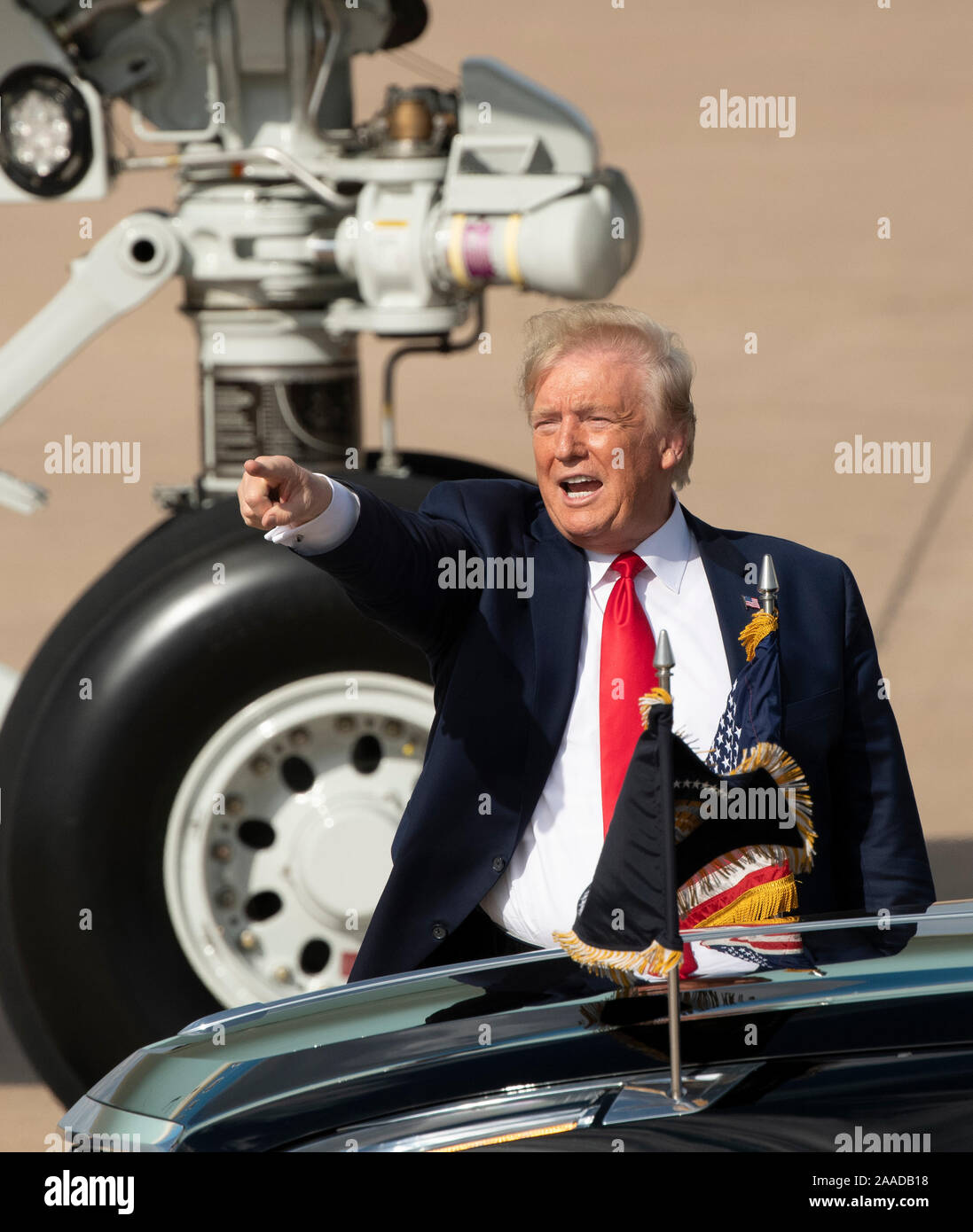 U.S. President Donald J. Trump acknowledges an invited crowd of supporters as he arrives at Austin Bergstrom International Airport for a short tour of an Apple assembly plant in north Austin. Stock Photo