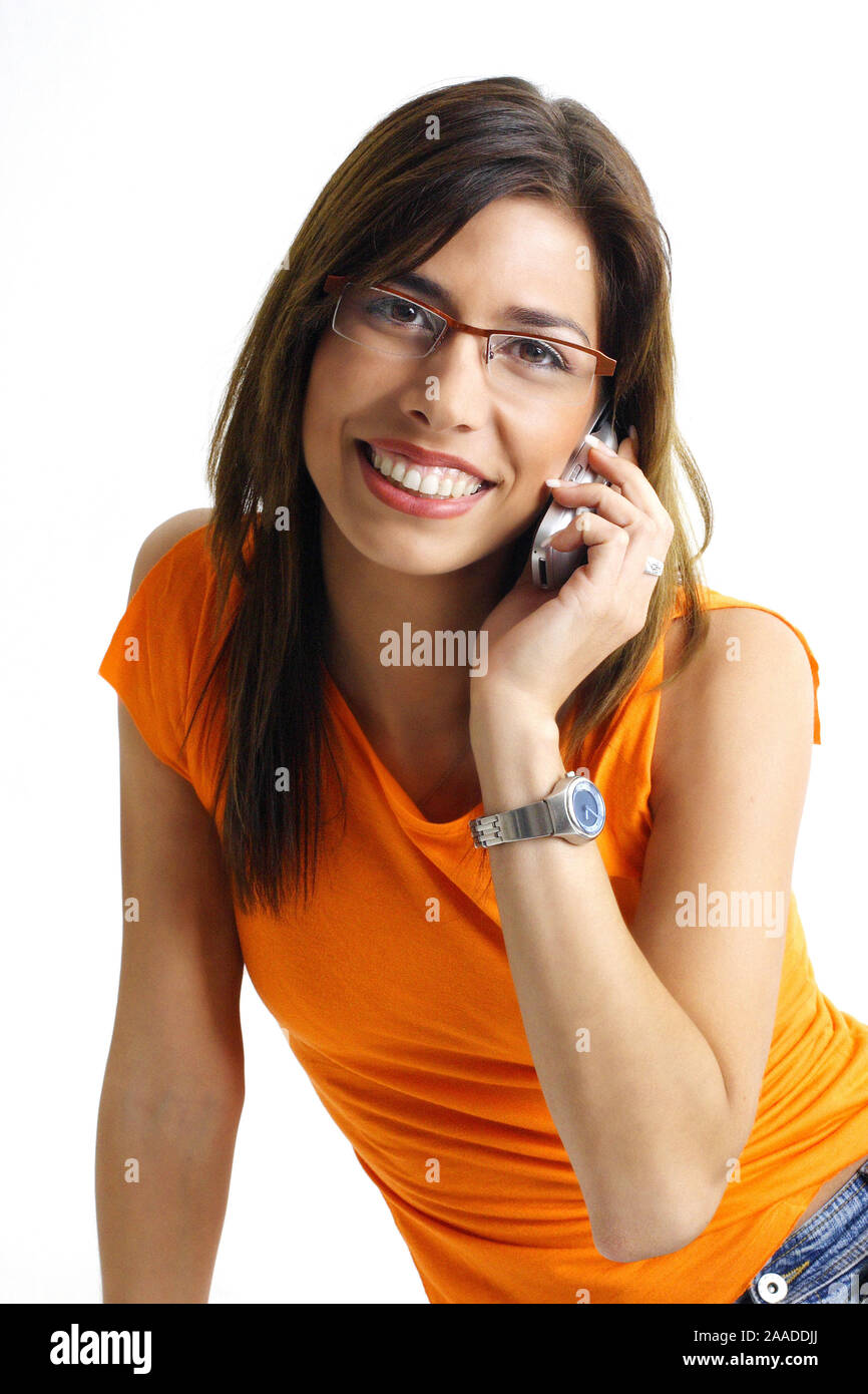 Junge Frau mit Brille telefoniert per Handy | young bespectacled woman calling via mobile phone Stock Photo
