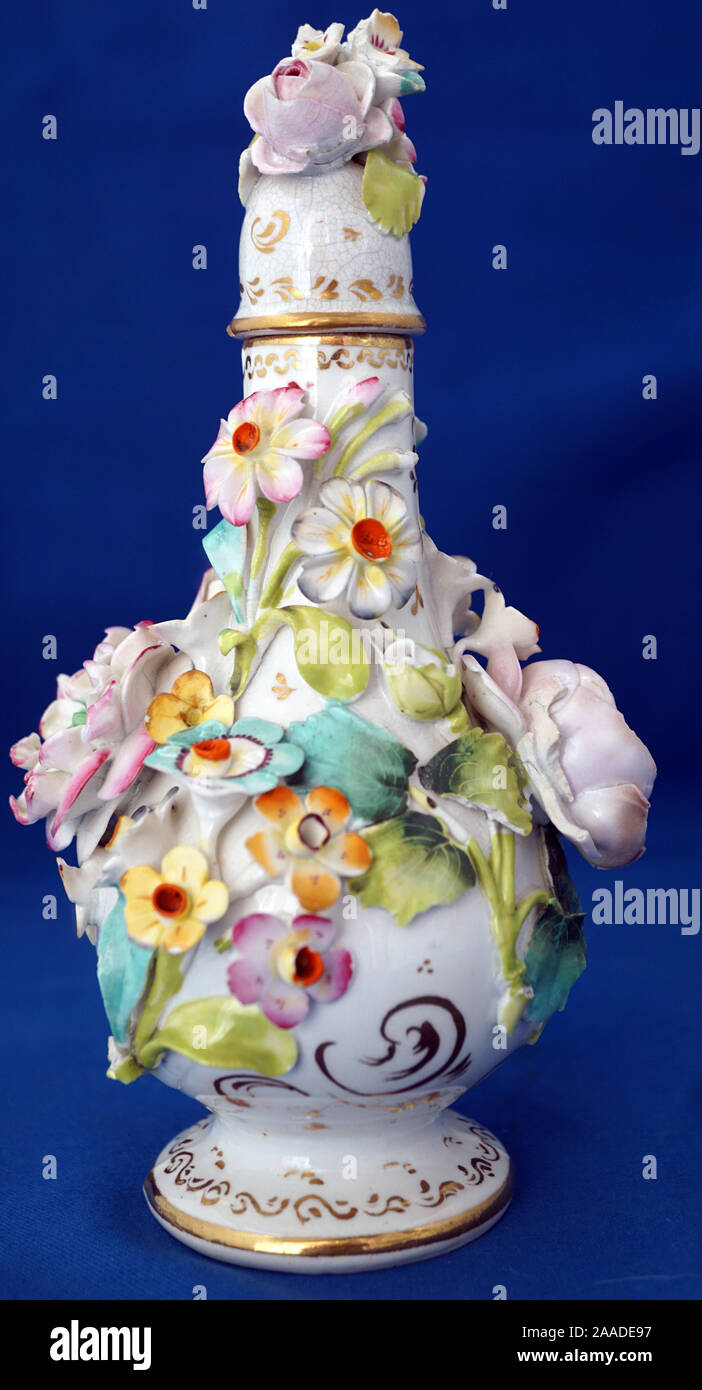 Antique British Porcelain Rockingham Flower Encrusted Scent perfume Bottle Stock Photo