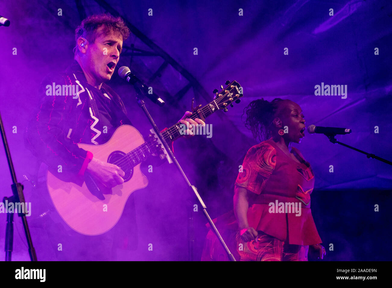 Johnny Clegg (left) and backing vocalist Mandisa Dlanga (right) sing