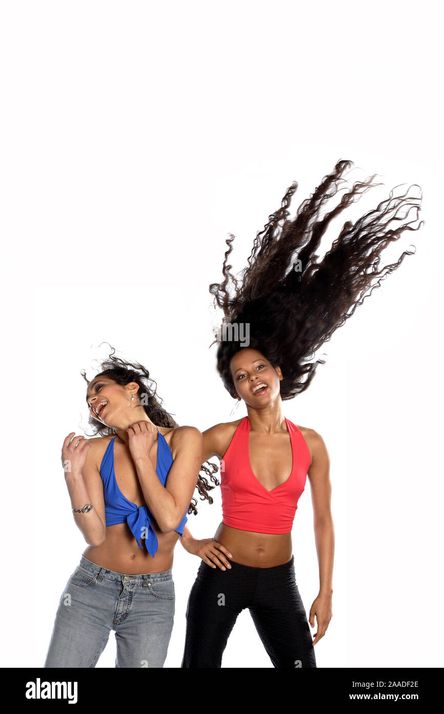 Zwei Maedchen tanzen zu Disco-Musik Stock Photo