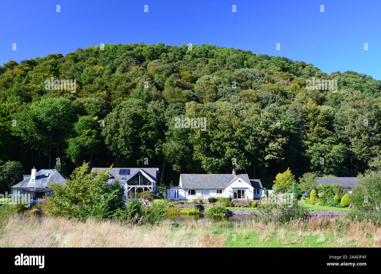 Houses by the Eamont, Pooley Bridge, Cumbria Stock Photo Alamy