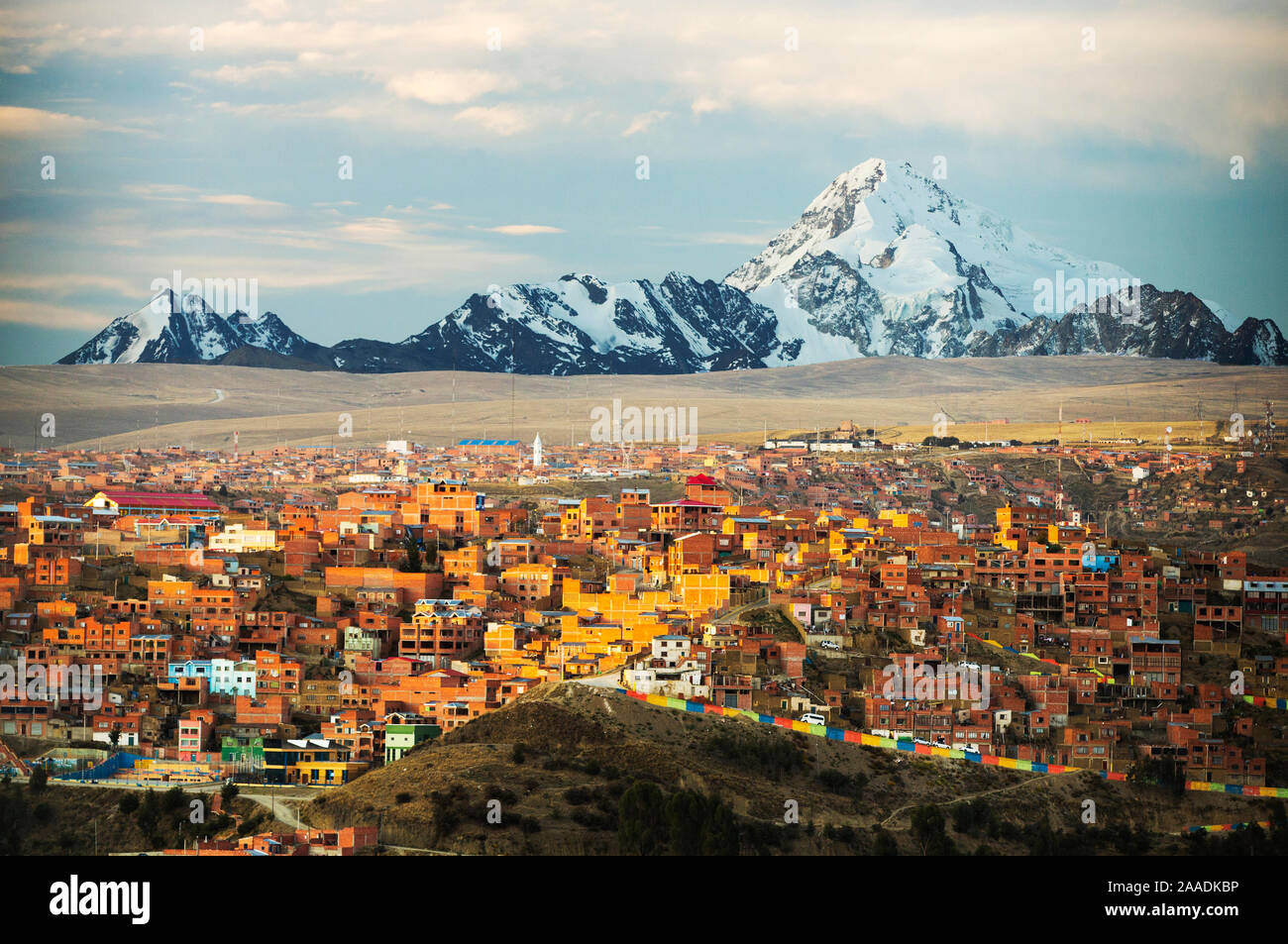 Peak of Huayna Potosi from El Alto above, La Paz, Bolivia. La Paz  and El Alto are critically short of water due to climate change causing  glaciers to melt. The glaciers provide water to the town. October 2015. Stock Photo