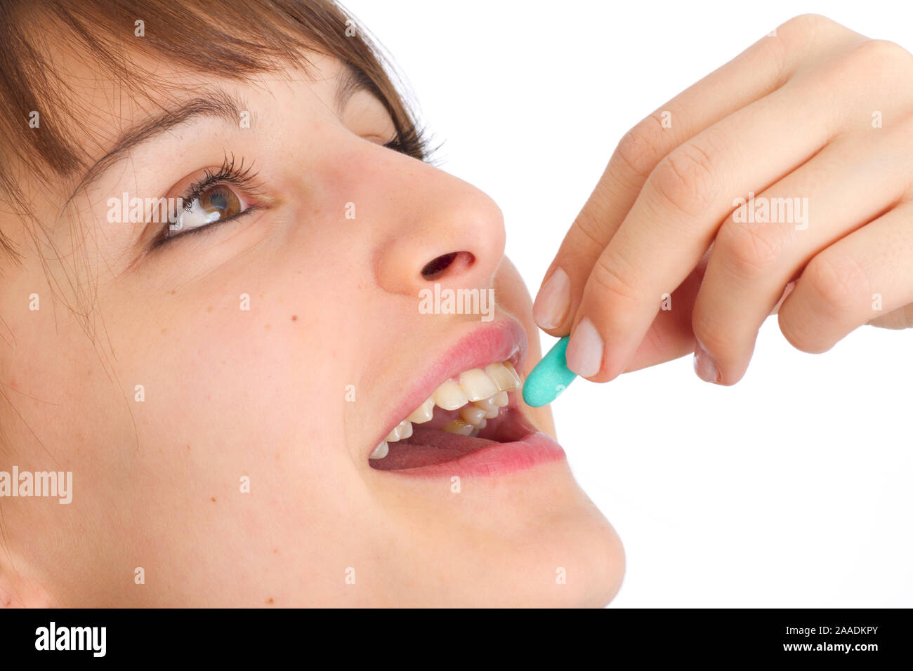 junge Frau schluckt Tablette Stock Photo