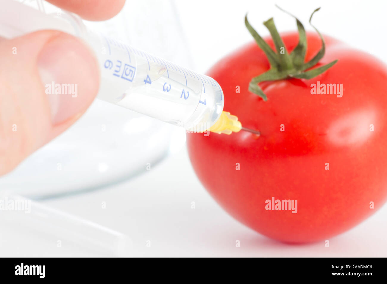 Spritze mit Tomate Stock Photo