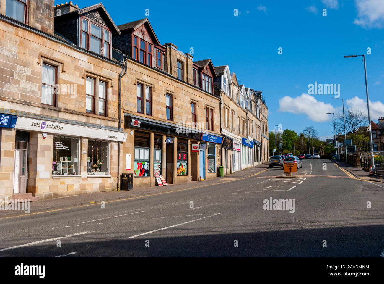 Shops and flats at the cross Kilmacolm Scotland Stock Photo Alamy