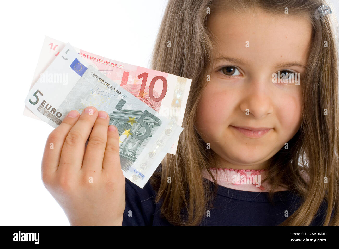 sechsjähriges Mädchen mit Geldscheinen (mr) Stock Photo