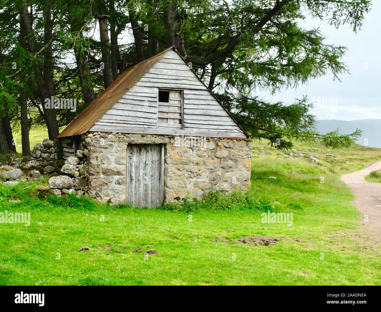 An old stone barn in a field Stock Photo