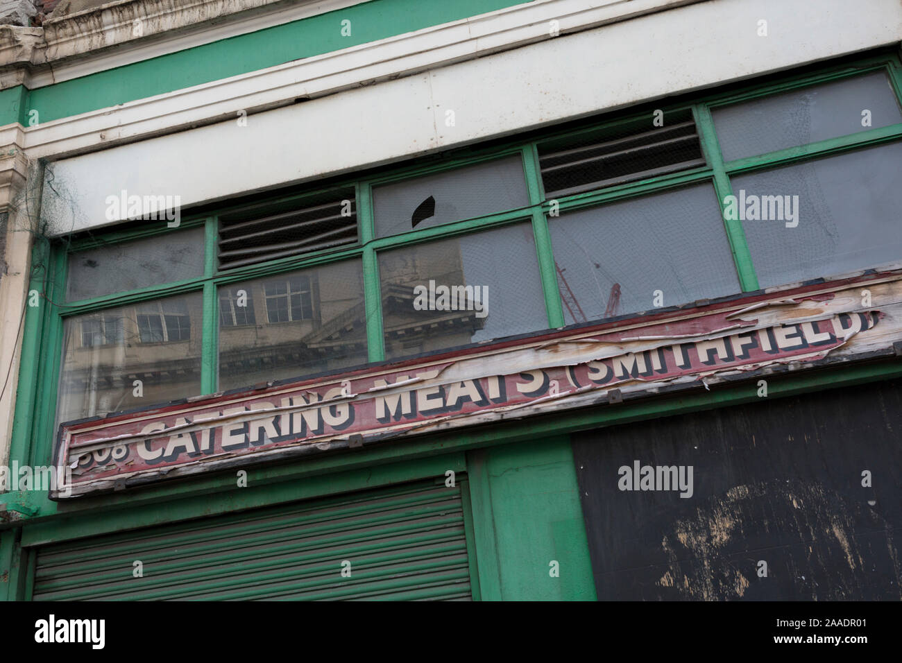 An architectural detail of a closed butcher business in the former Smithfield meat market that is awaiting future redevelopment, on 20th November 2019, at Smithfield in the City of London, England. In March 2015, the Museum of London revealed plans to vacate its Barbican site and move into the General Market Building. The cost of the move is estimated to be in the region of £70 million and, if funding can be achieved, would be complete by 2021. There has been a market on this location since the Bartholomew Fair was established in 1133 by Augustinian friars. Stock Photo