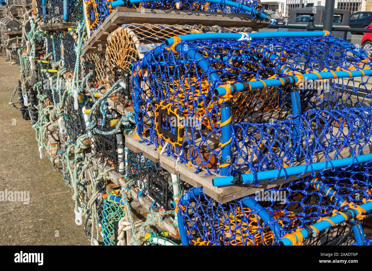Close up of stacks of lobster and crab pots sea fishing industry on the quayside Scarborough North Yorkshire England UK United Kingdom Great Britain Stock Photo