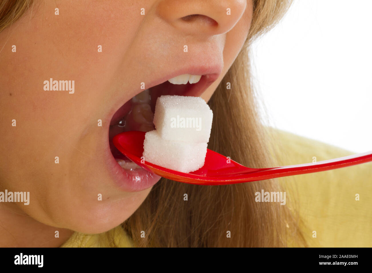 Mädchen isst Zucker Stock Photo