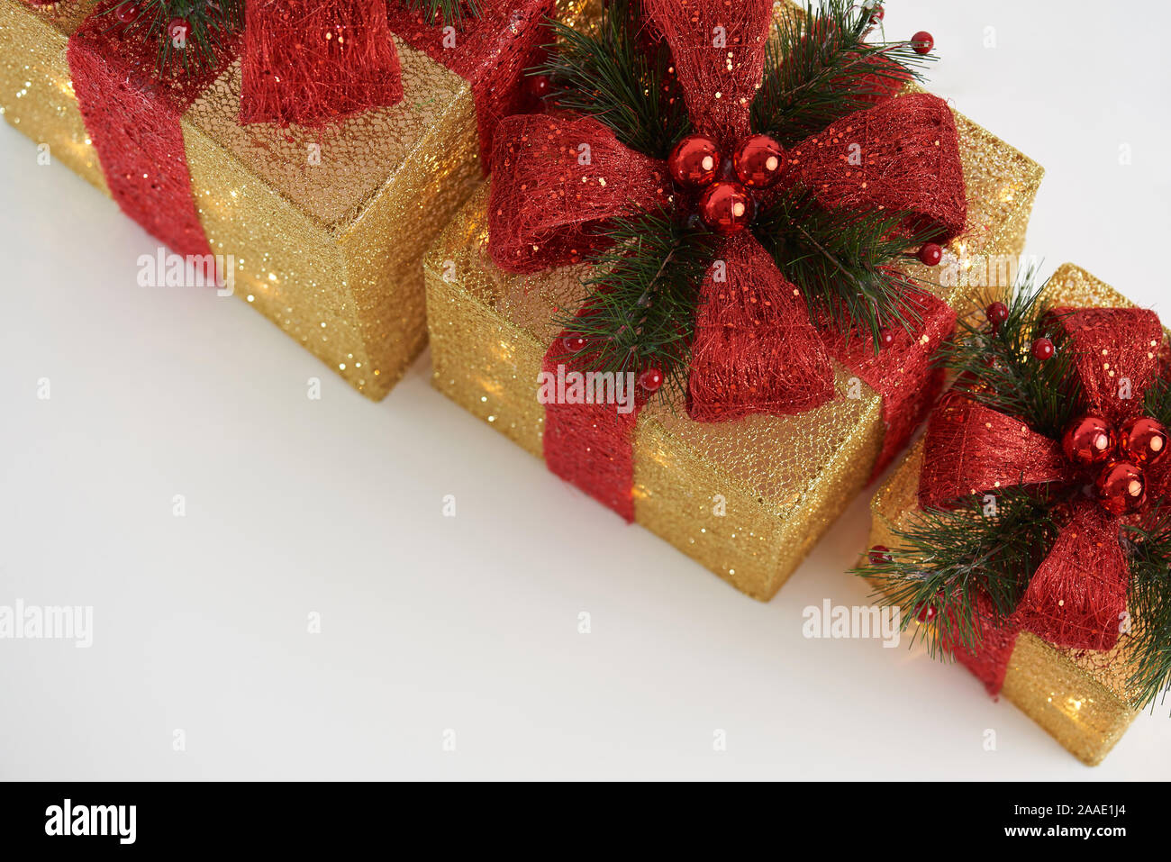 Xmas present boxes above top view on white isolated background Stock Photo