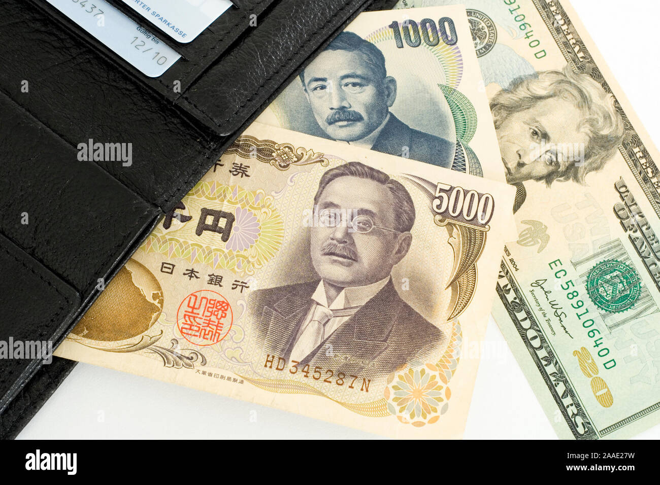 Geldscheine in japanischen Yen und US-amerikansichen Dollar (no pr) Stock Photo