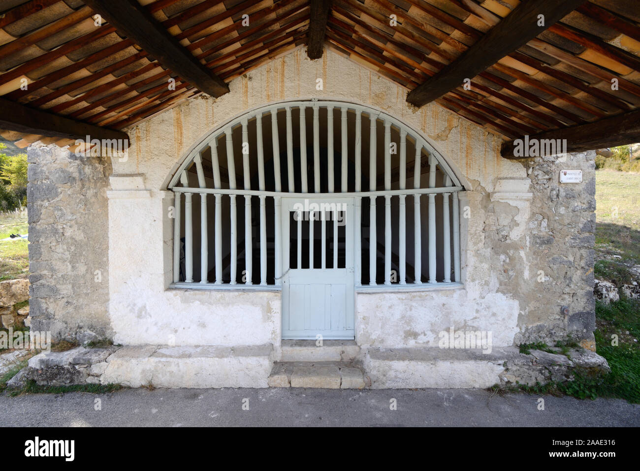 Wooden Entrance Door, Porch & Old Wooden Screen of Saint Roch Chapel (1629) Trigance Var Provence France Stock Photo