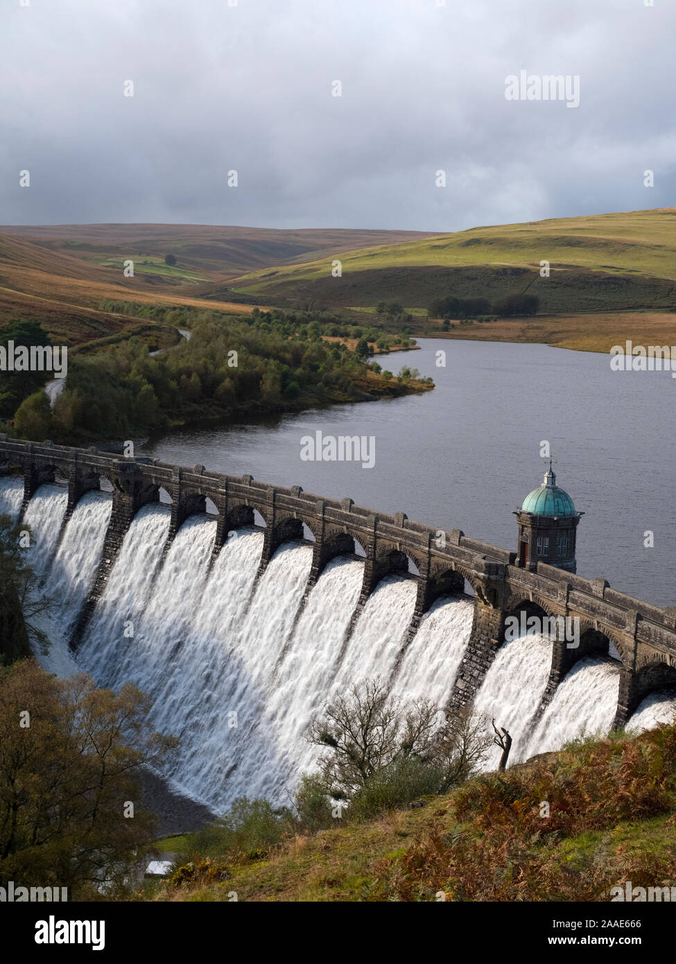 Craig Goch Dam overflowing and reservoir, Elan Valley, Wales UK. Stock Photo