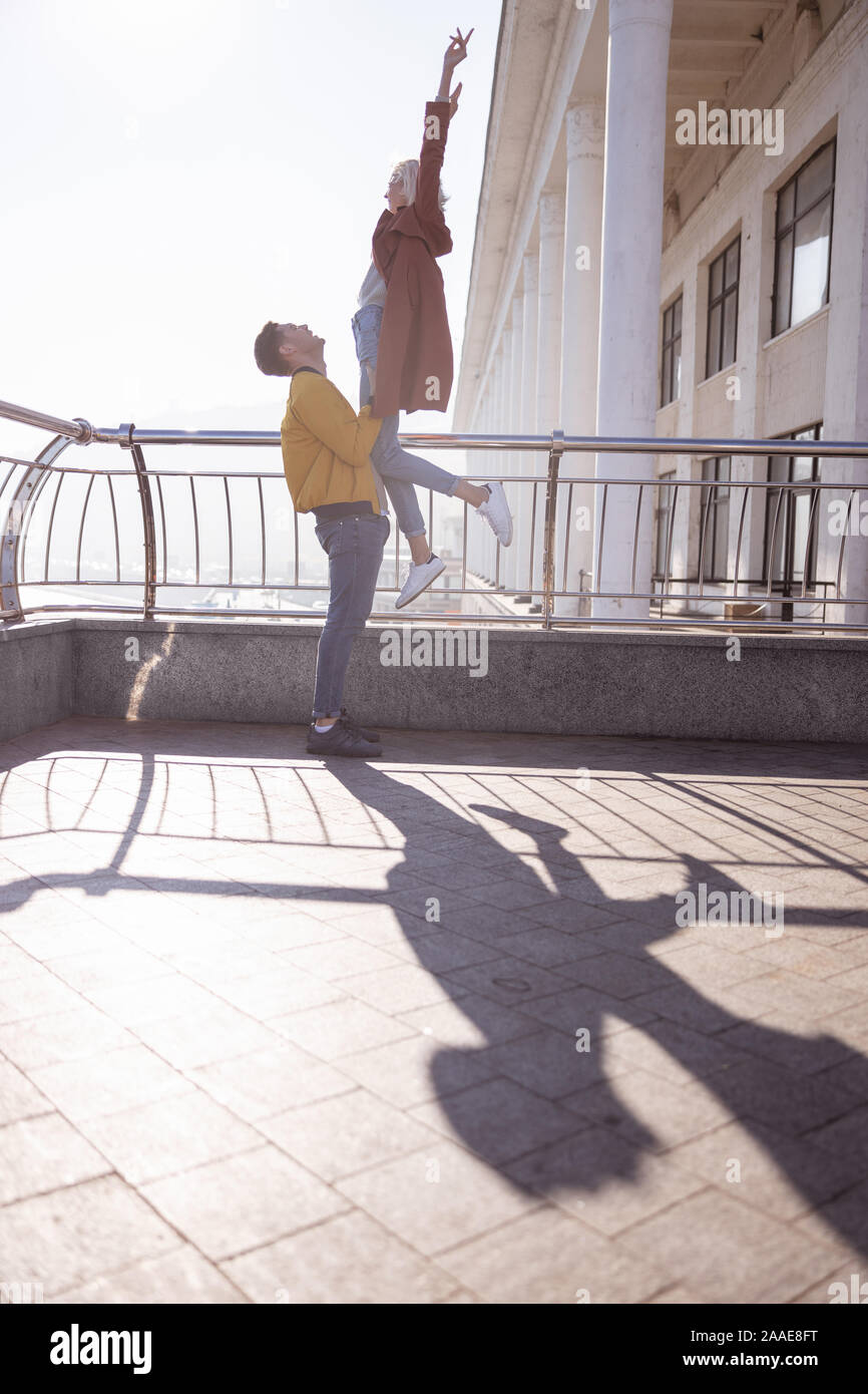 Beautiful woman feeling wonderful during her morning date Stock Photo
