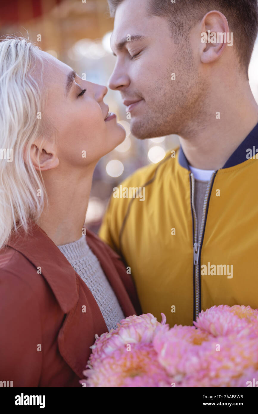 Beautiful couple going to kiss each other Stock Photo Alamy