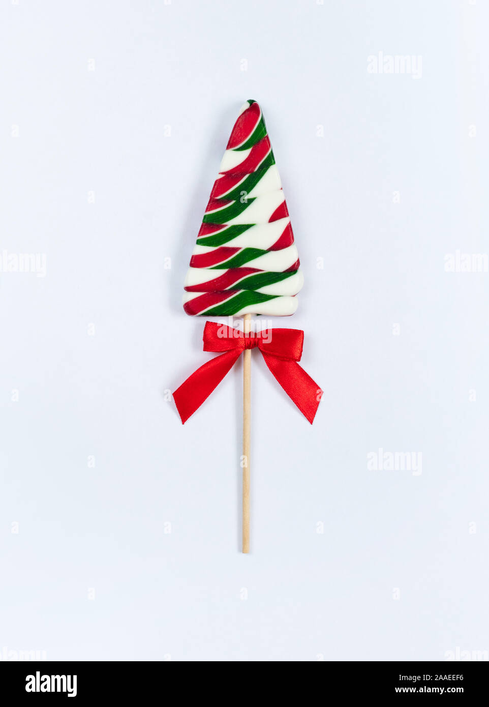 Christmas Lollipop With Red Bow On White Background Lollipop In
