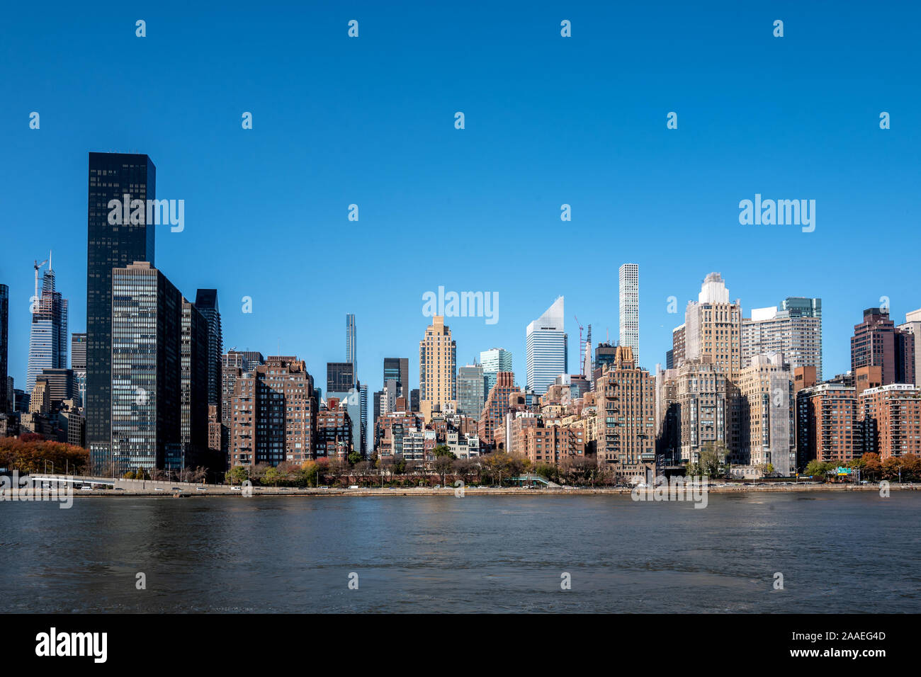 The New York City skyline from Roosevelt Island in the East River Stock ...