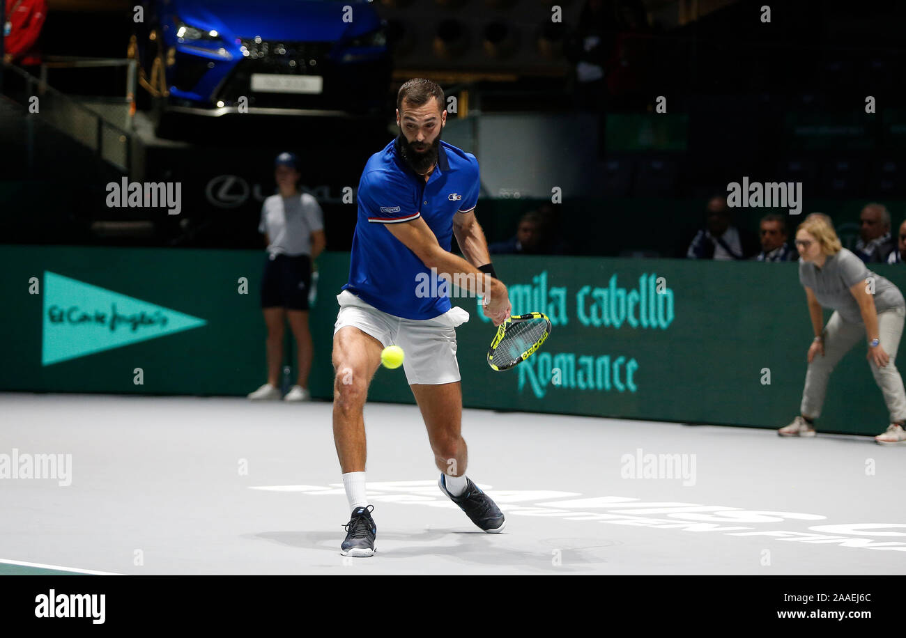 Benoit Paire of France in action against Novak Djokovic of Serbia during Day 4 of the 2019 Davis Cup at La Caja Magica. Stock Photo