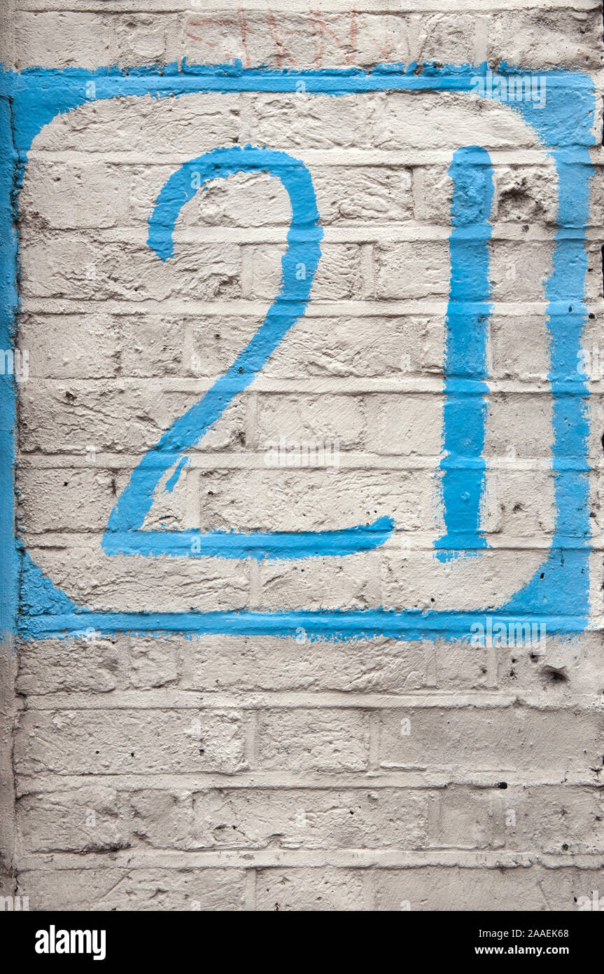 A Close Up Of A Hand Painted Number Twenty One Door Number Stock Photo
