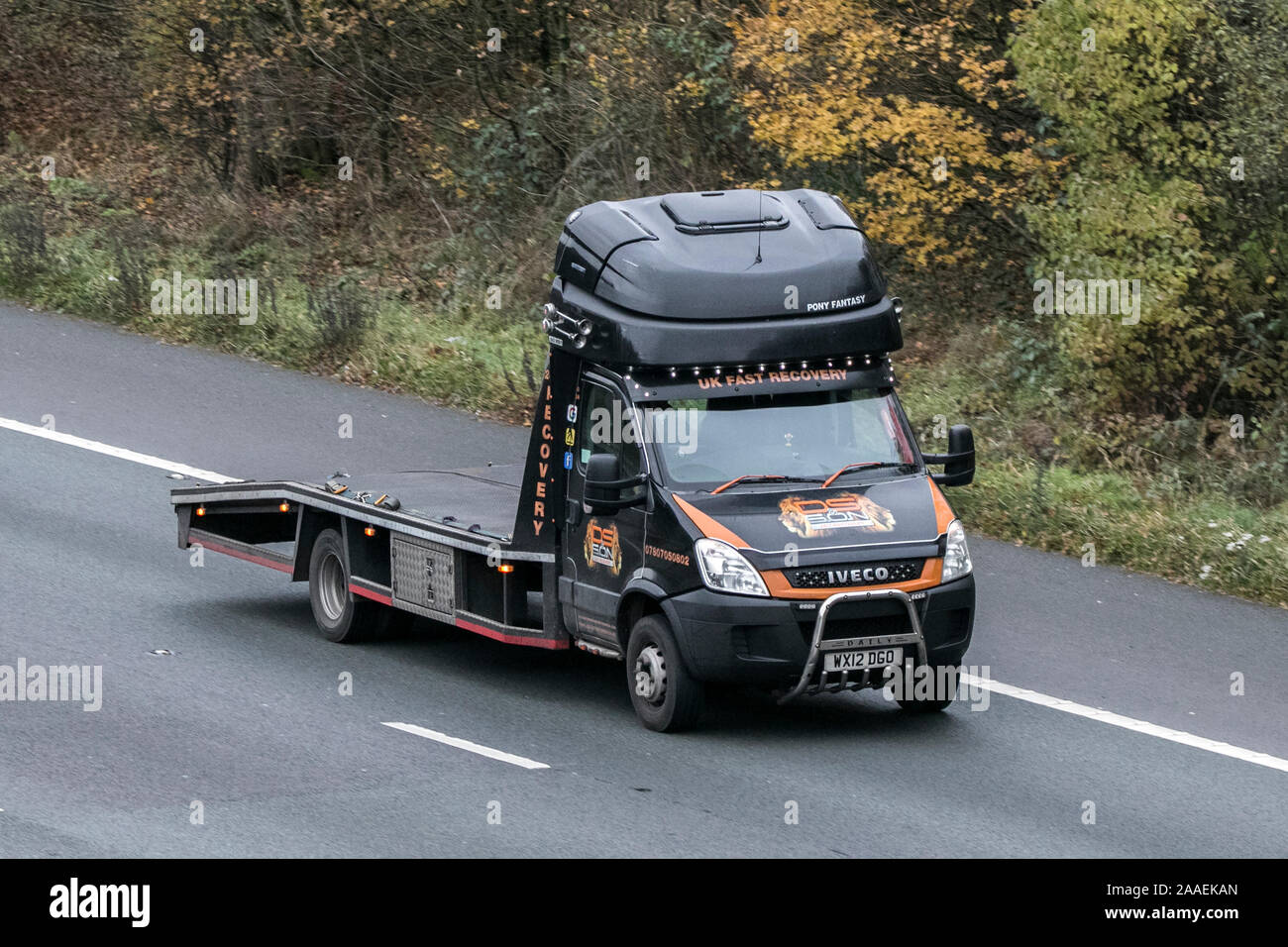 Iveco flatbed breakdown recovery truck Stock Photo