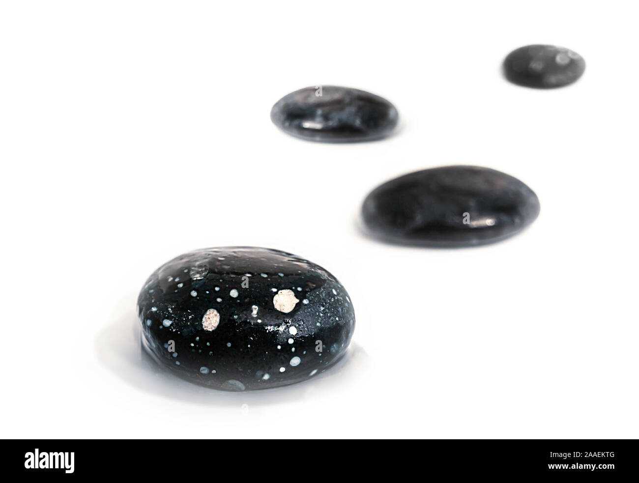 wet beach tumblestones pebbles, on white Stock Photo