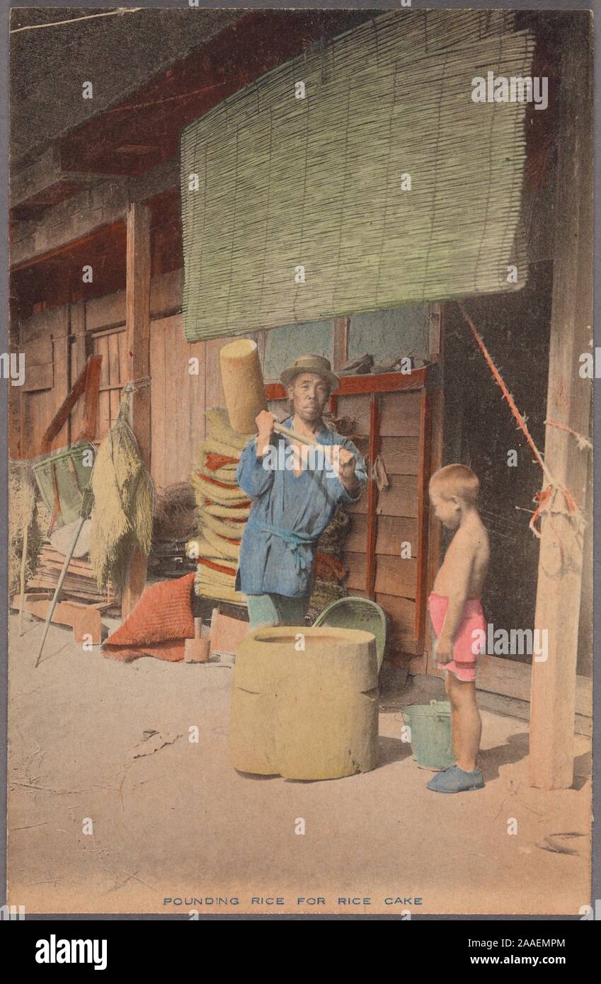 Illustrated postcard of a Japanese farmer pounding rice with a wooden mallet to make rice cake, with a boy looking on, Japan, 1915. From the New York Public Library. () Stock Photo