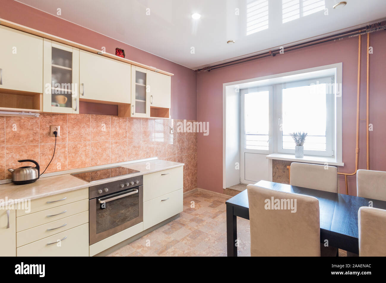 Russia, Moscow- July 06, 2019: interior room apartment. standard repair decoration in hostel. kitchen and dining room Stock Photo