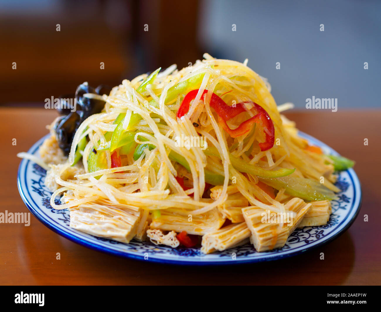 A traditional Chinese cold dish of shredded potato salad, yuba / tofu