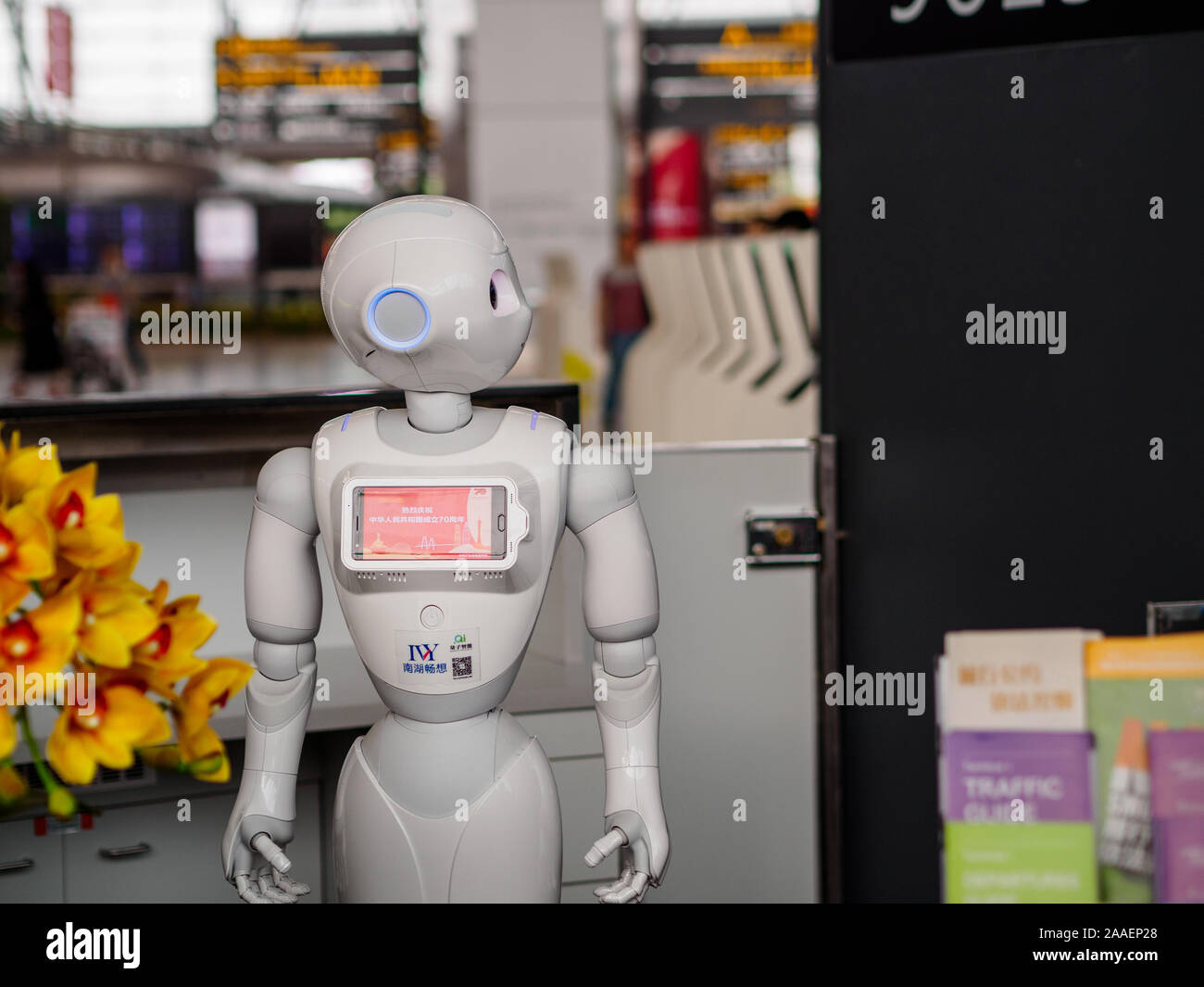 GUANGZHOU, CHINA - 9 OCT 2019 – Close up of smart passenger service robot at Guangzhou Baiyun Airport. The robots provide flight information, navigati Stock Photo