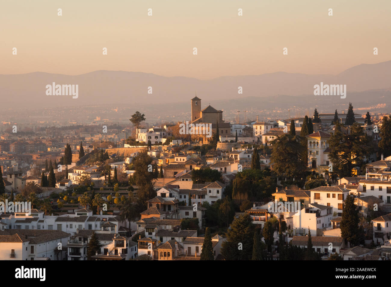 A view of the city of Granada from the Alhambra palace complex, Andalusia, Spain on a beautiful hazy winter's day Stock Photo