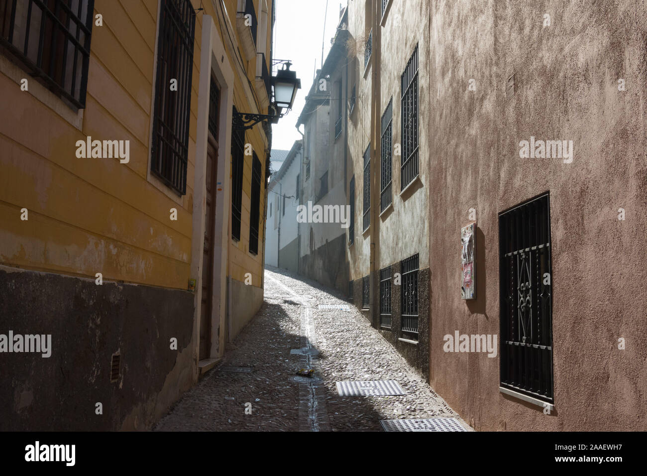 A steep, narrow street in Albaicín, Granada, Spain. Stock Photo