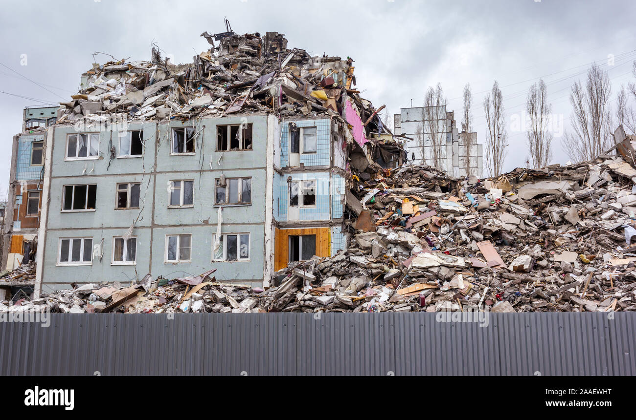 Demolition of buildings in urban environments. House in ruins. Stock Photo