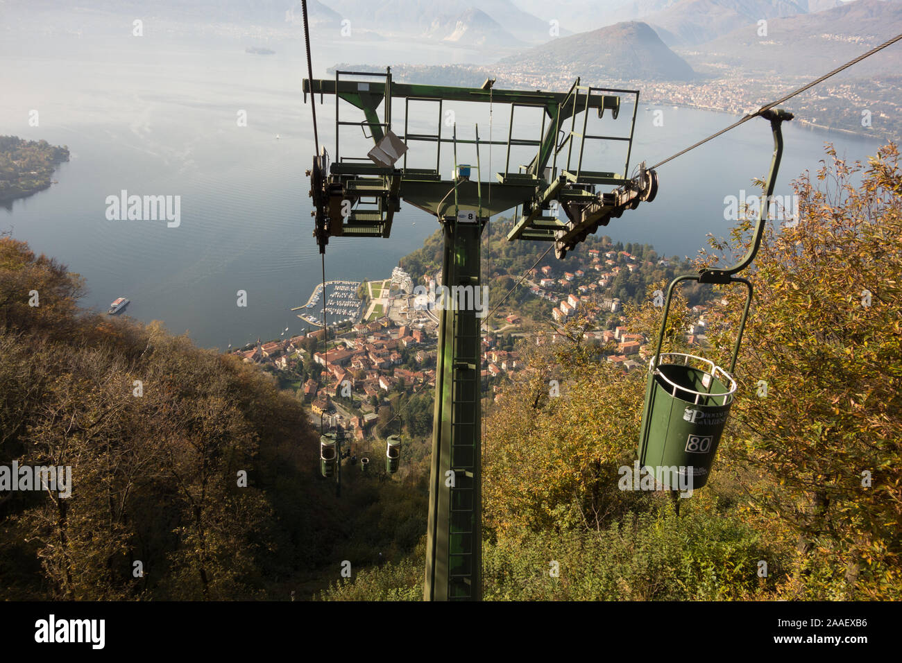 The view on the funicular ride between the town of Laveno-Mombello to the top of Sasso del Ferro mountain, Italy. Lake Maggiore can be seen below. Stock Photo