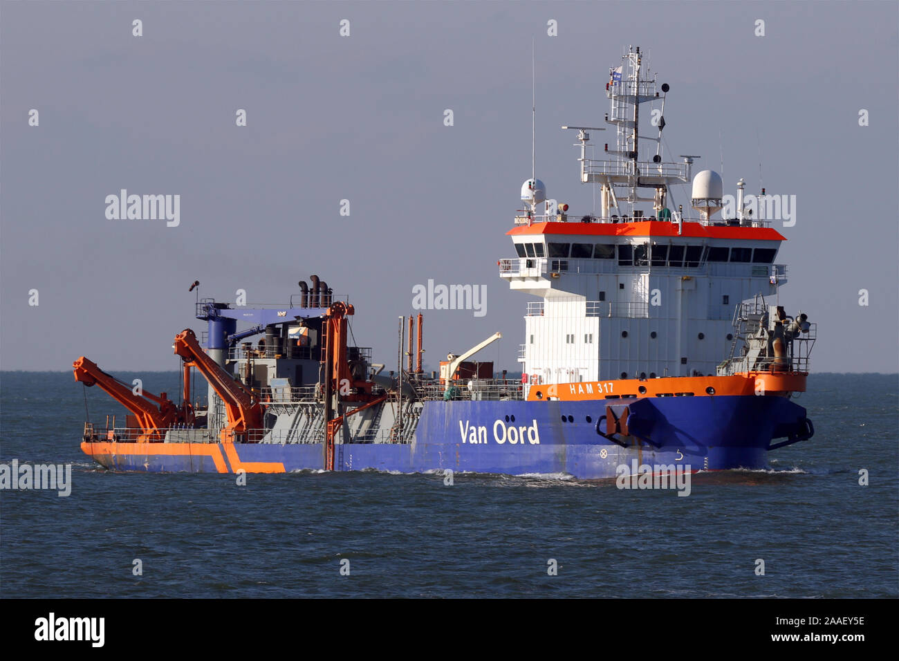 The dredger HAM 317 operates on 30 October 2019 in front of the port of Rotterdam on the Maasvlakte. Stock Photo