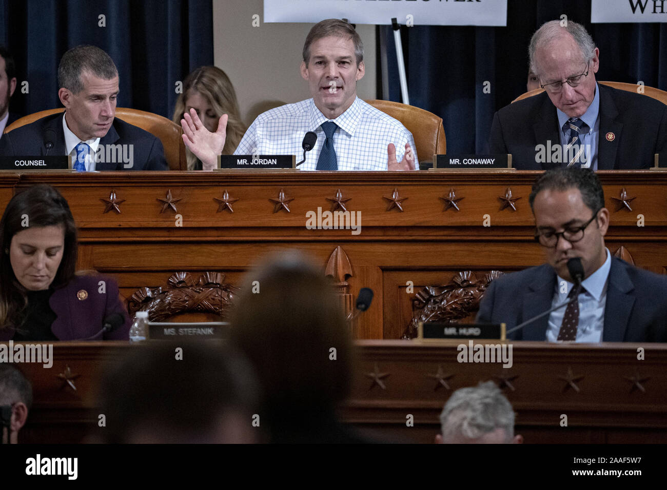Washington, United States. 21st Nov, 2019. Representative Jim Jordan, a Republican from Ohio, top center, questions witnesses as Steve Castor, general counsel for the Oversight and Government Reform Committee, top left, and Representative Mike Conaway, a Republican from Texas, top right, listen during a House Intelligence Committee impeachment inquiry hearing in Washington, DC, U.S., on Thursday, Nov. 21, 2019. The committee hears from nine witnesses in open hearings this week in the impeachment inquiry into President Donald Trump. Credit: UPI/Alamy Live News Stock Photo