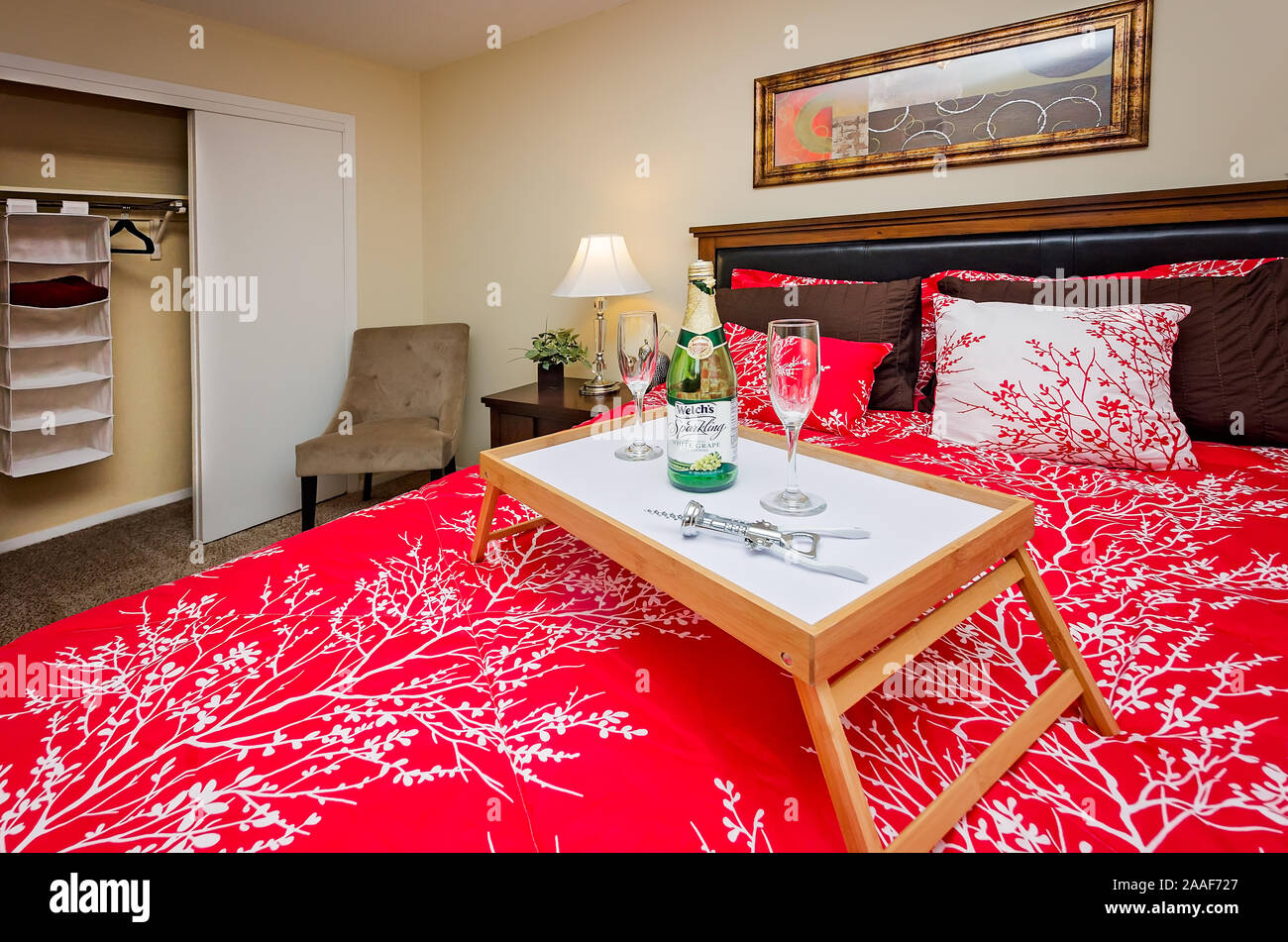 A bed tray sits on a bed at Four Seasons apartments in Mobile, Alabama