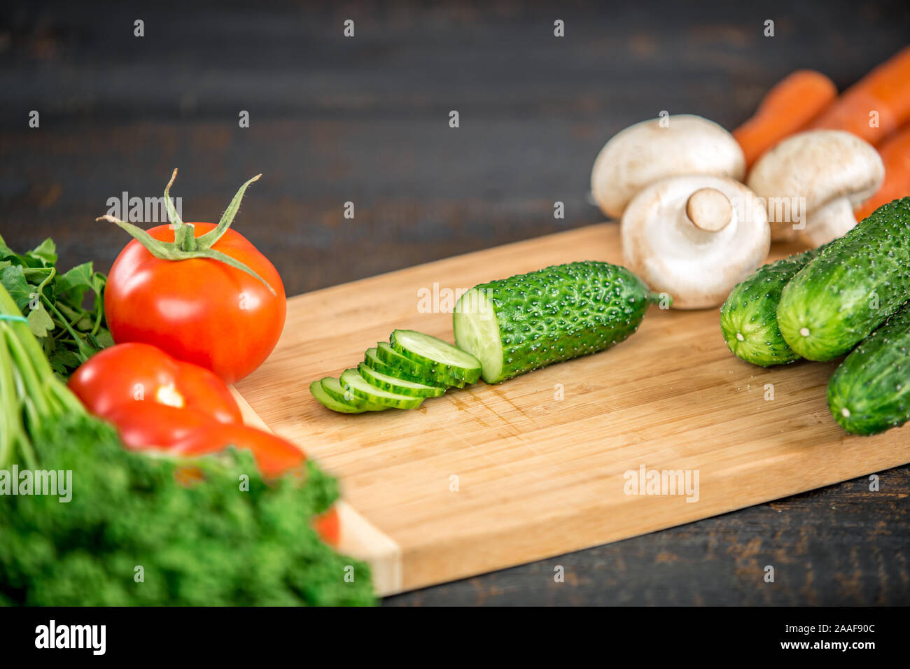 cutting vegetables for salad Stock Photo Alamy