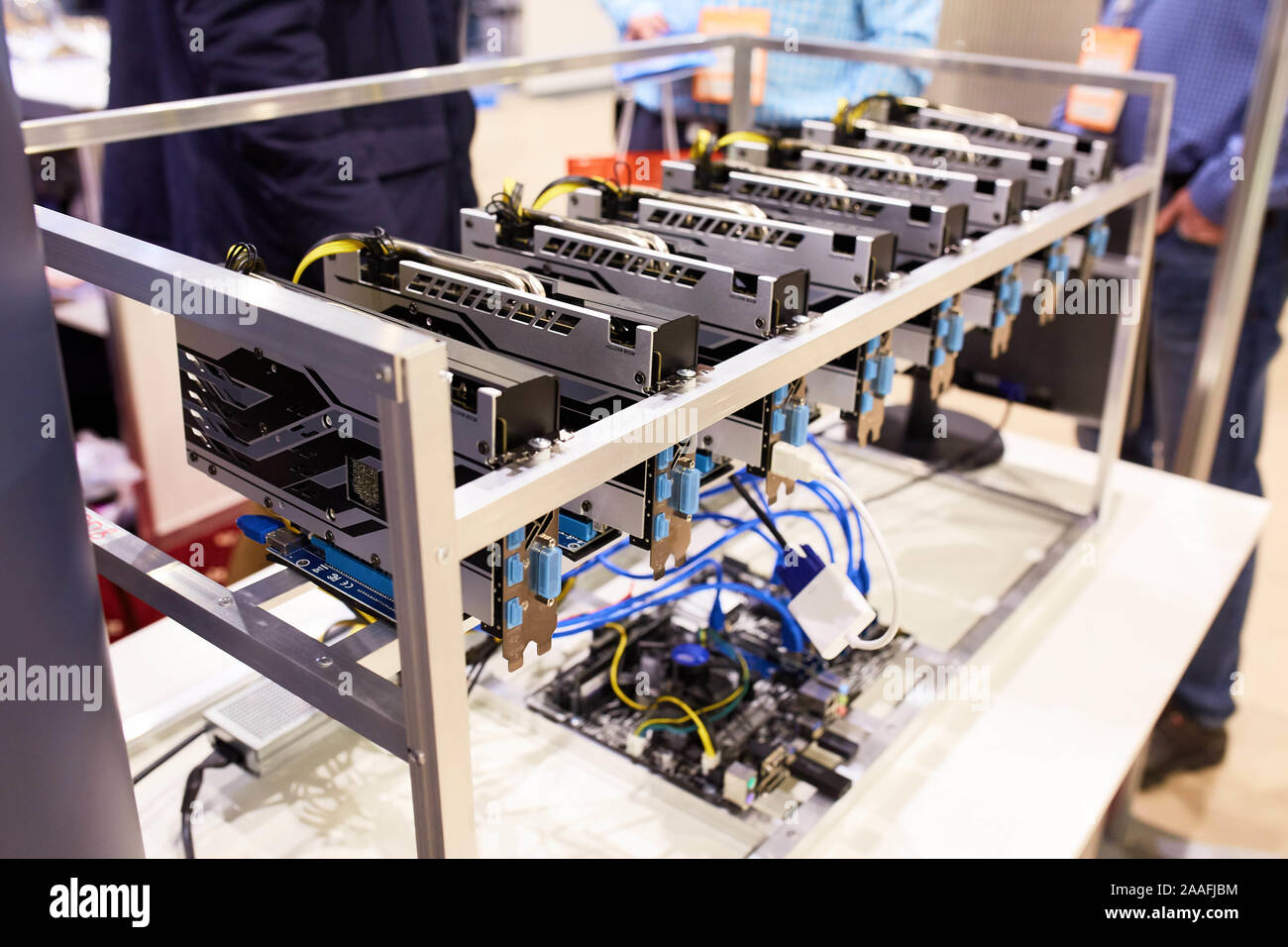 Crypto currency ethereum mining equipment rig - lots of gpu cards on  mainboard. Graphics processing units connected to motherboard with cables.  Server Stock Photo - Alamy