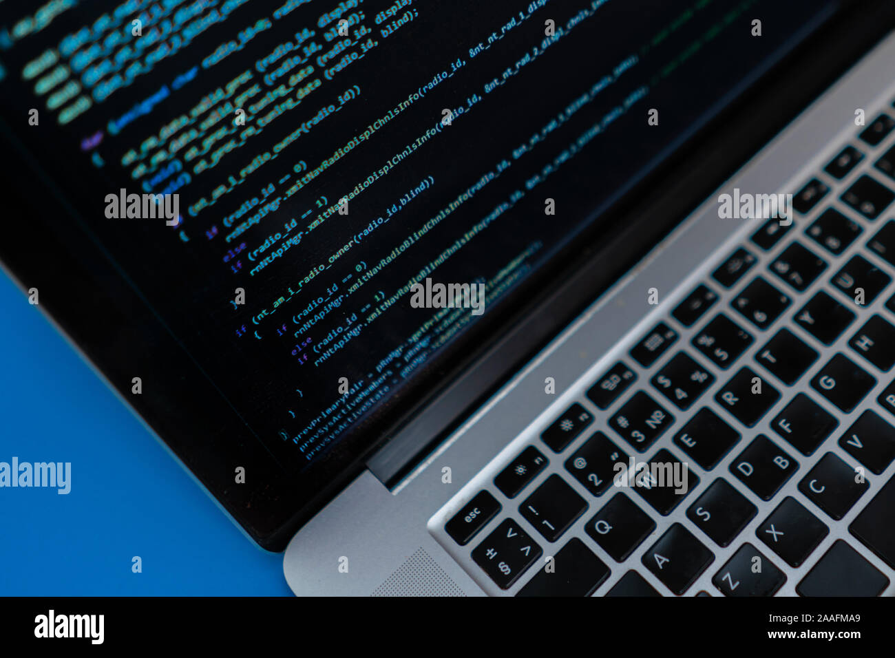 close up laptop computer screen with a programming code creating Stock ...