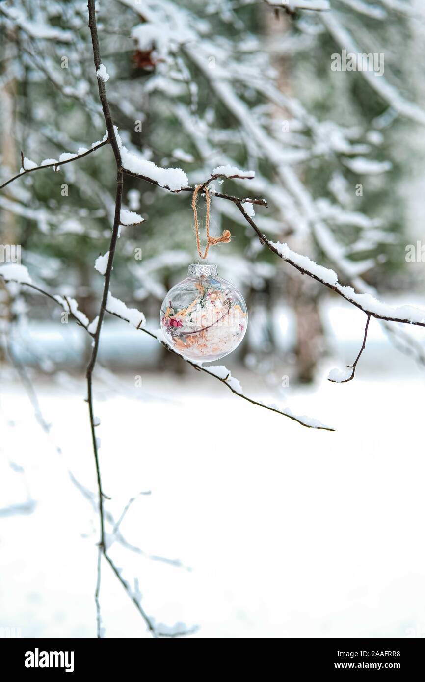 Red And White Christmas Decoration Hanging Outside On A Frosty