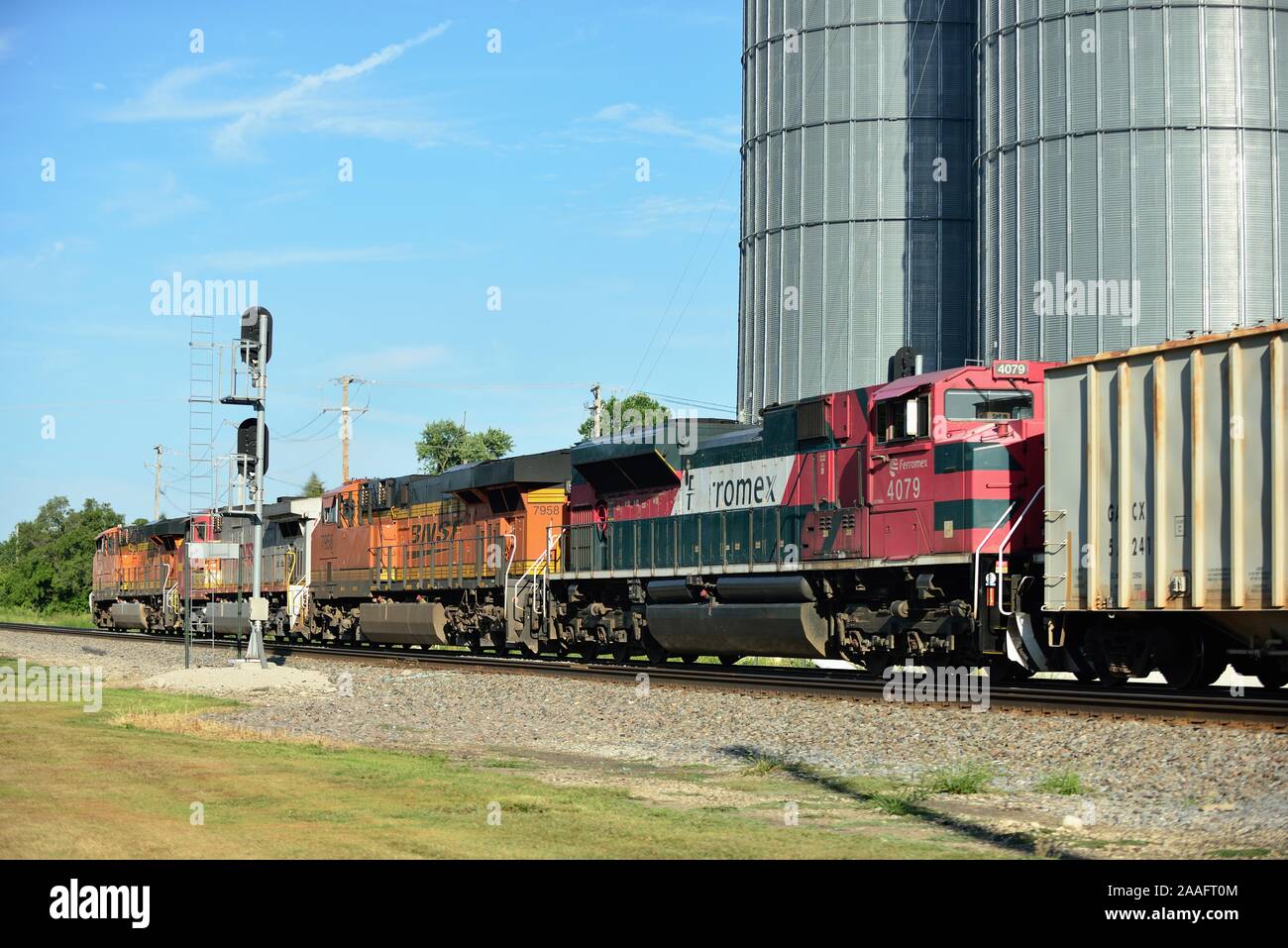 Sandwich, Illinois, USA. A Burlington Northern Santa Fe freight train, led by multiple locomotives. Stock Photo