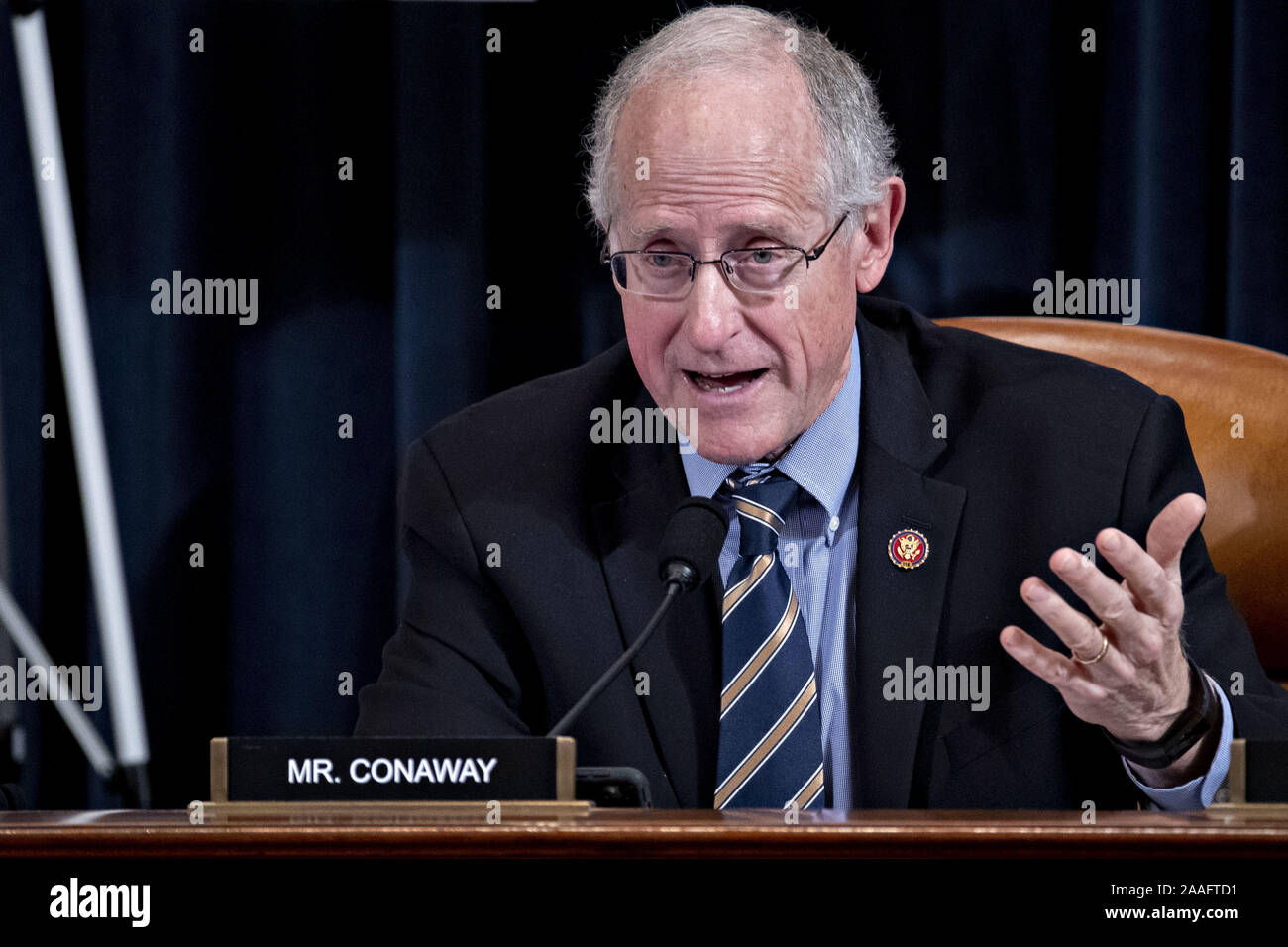 Washington, United States. 21st Nov, 2019. Representative Mike Conaway, a Republican from Texas, questions witnesses during a House Intelligence Committee impeachment inquiry hearing in Washington, DC, U.S., on Thursday, Nov. 21, 2019. The committee hears from nine witnesses in open hearings this week in the impeachment inquiry into President Donald Trump. Credit: UPI/Alamy Live News Stock Photo