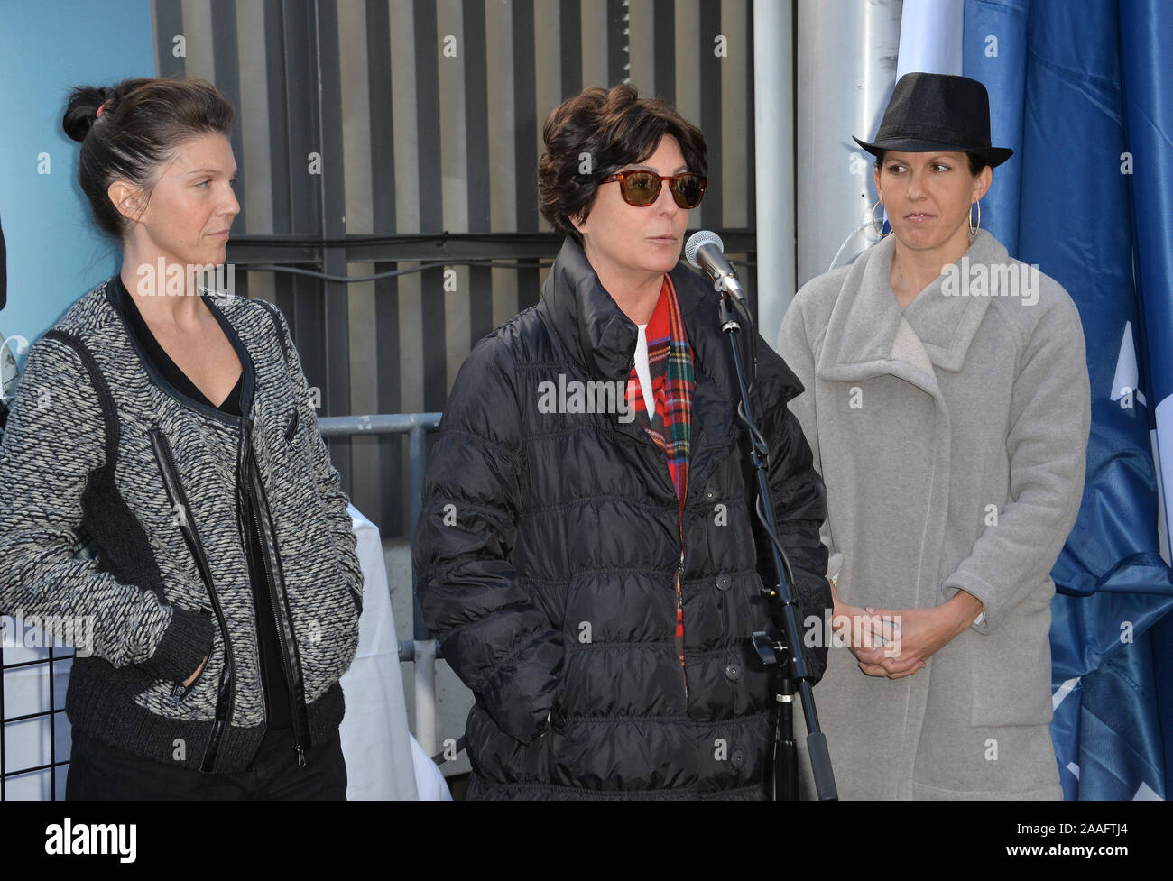 LOS ANGELES, CA. December 11, 2015: Tina Sinatra (centre), daughter of Frank Sinatra, & his granddaughters AJ Lambert (left) & Amanda Erlinger at the ceremony atop the Capitol Records Building in Hollywood to raise a 100th birthday flag in honor of singer Frank Sinatra who was born 100 years ago on 12th December.  © 2015 Paul Smith / Featureflash Stock Photo