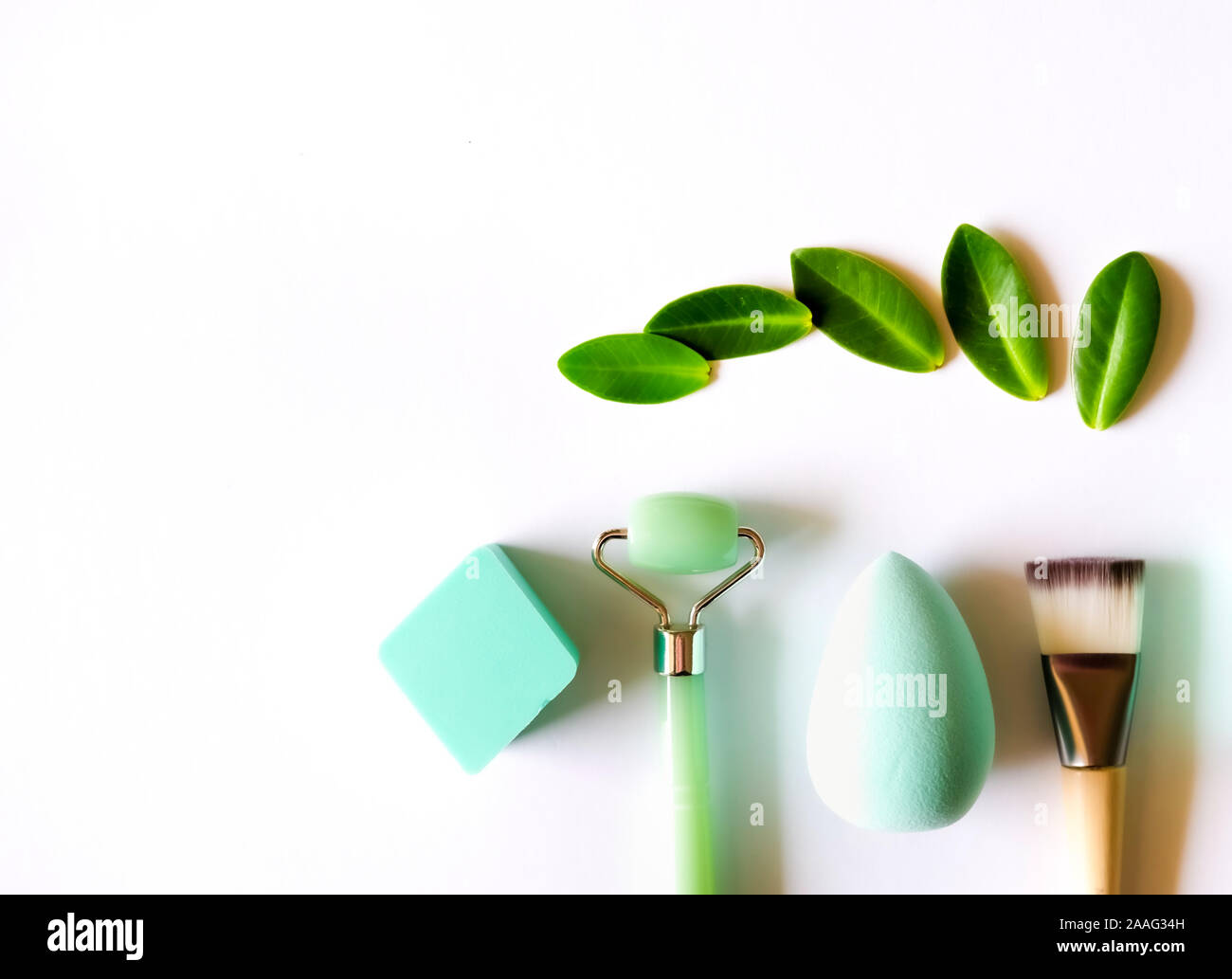 Green skin care tools Stock Photo Alamy