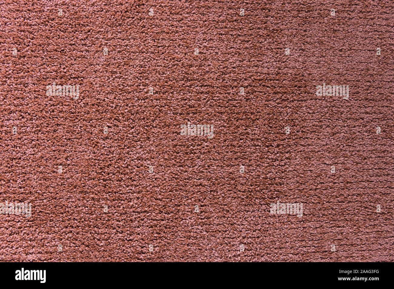 Red artificial carpet texture close-up, top view Stock Photo - Alamy